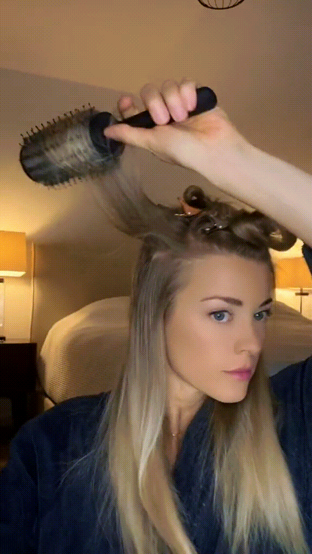 dryspike hair dryer tool being used be a at home user for a blowout