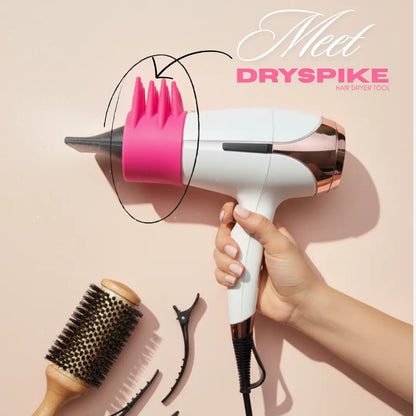 Hair dryer with pink dryspike blowout tool and attachments on a beige background, featuring the brand 'DRYSPIKE'.